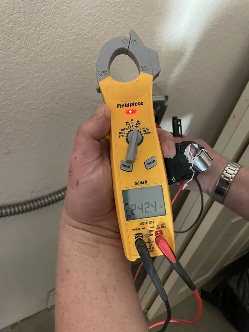 Voltage testing with clamp meter during Outlet Installation in Worcester